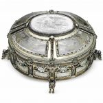 A VIENNESE SILVER-GILT, ENAMEL AND ETCHED ROCK-CRYSTAL OVAL BOX CIRCA 1880