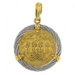 FRED - an 18ct gold and steel 'Force 10' Zodiac pendant