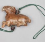 Chinese dress toggle in a shape of a goat