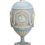 AN ENGLISH THREE COLOR JASPERWARE 'ZODIAC' VASE AND COVER, IMPRESSED UPPERCASE MARK FOR WEDGWOOD, EARLY 19TH CENTURY