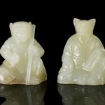 Two greenish-white jade seated Zodiac human figures 18th Century