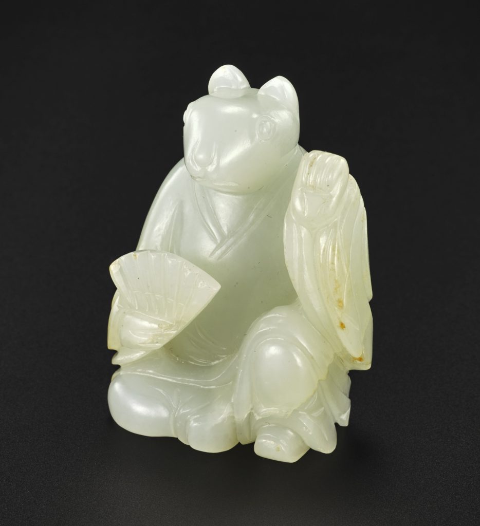 A WHITE AND RUSSET JADE ZODIAC FIGURE OF A RAT QING DYNASTY, QIANLONG PERIOD