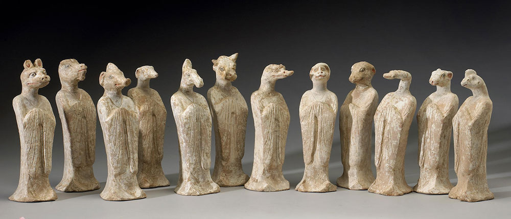 A group of twelve pottery mortuary zodiac figures