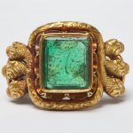 Rectangular, chamfered emerald, engraved with a Persian verse