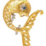 18 Karat Bicolor Gold, Sapphire and Diamond Fish Motif Brooch