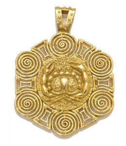 An eighteen karat gold astrological pendant, Van Cleef & Arpels