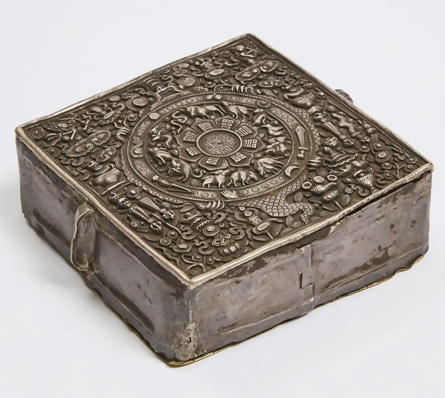 A Tibetan Silver Portable Amulet Box with Astrological Wheel