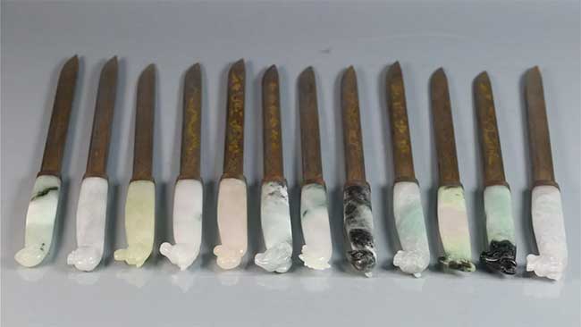 A SET OF TWELVE ZODIAC DAGGERS WITH JADEITE HANDLES